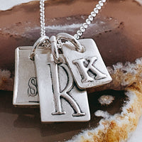 mixed font initial charms sterling