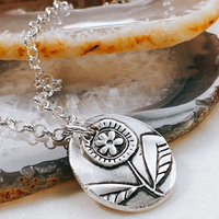 raised flower charm necklace