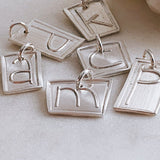 sterling artisan initial charms
